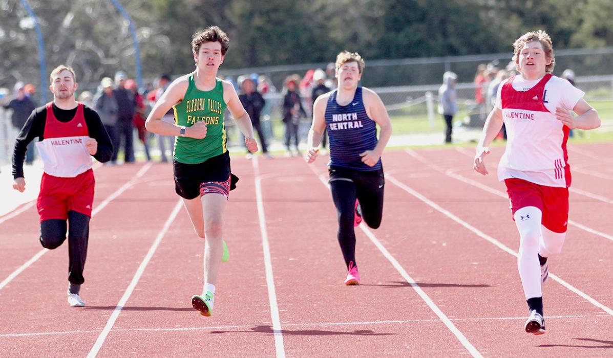 Trevor Burdick and Parker Chavez compete in the 400 Meter Dash.