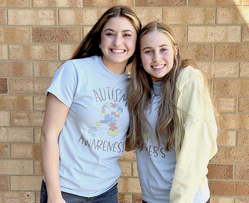 VHS staff wear their homemade autism awareness T-shirts, April 10, 2024 that were made by Alivia Patterson and Cianna Colvin, pictured below left.