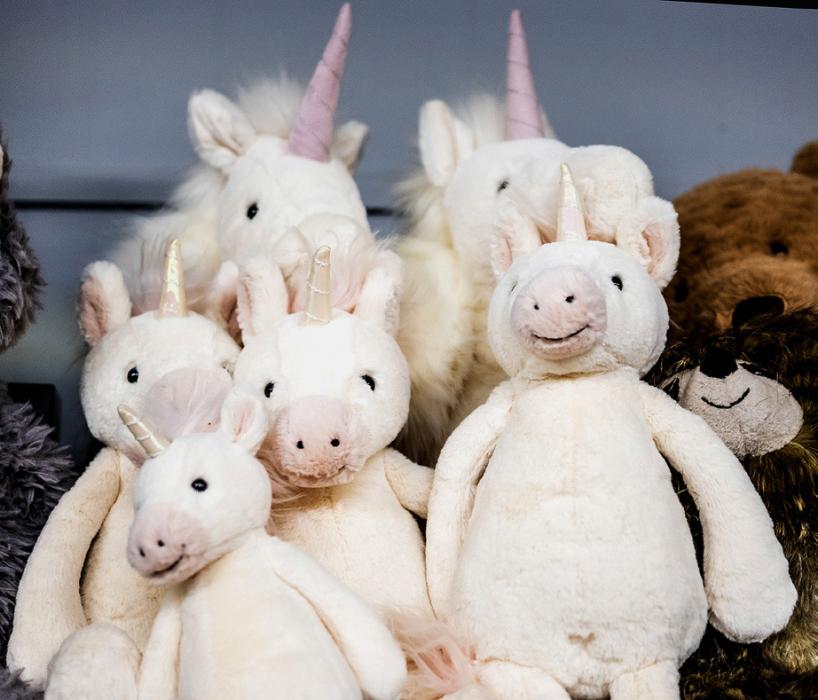 How about a unicorn to top off stockings? You can find them at Janine’s Flower Exchange. Photos by Laura Vroman