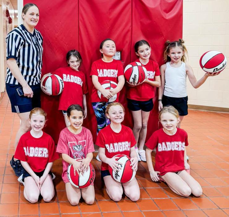 Second grade girls Back row, L to R: Coach Sam Hand, Evie King, Adalyne Valen, Kaydence Brashear, Vivian Carr. Front row, L to R: Juliette Arganbright, Bryelle Bukaske, Myla Limbach, and Lydia Hand.