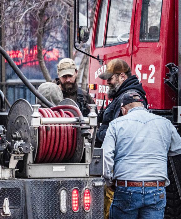 Keya Paha firefighters change shifts at the VFD. There were many mutual aid departments helping throughout the state as there many fires due to drought and red flag weather conditions.