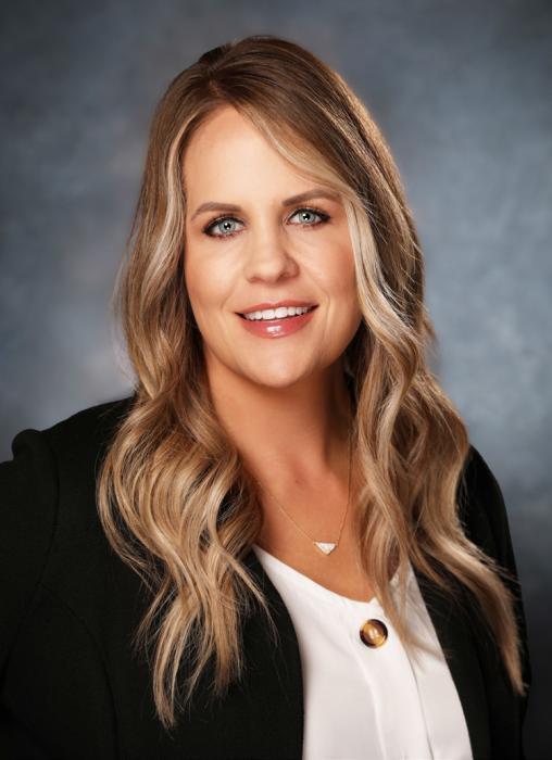 Talia Benson earns CDFA designation.