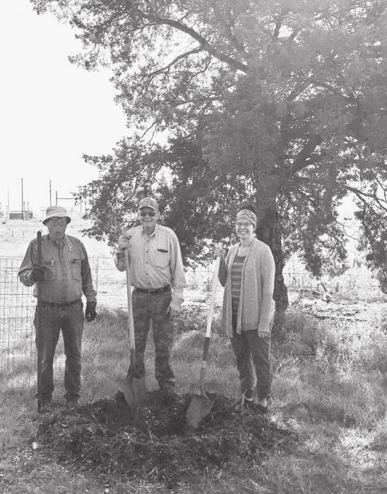 Planting are from L to R: Ron Brown, Lonie Snell and Katie Rhodes.