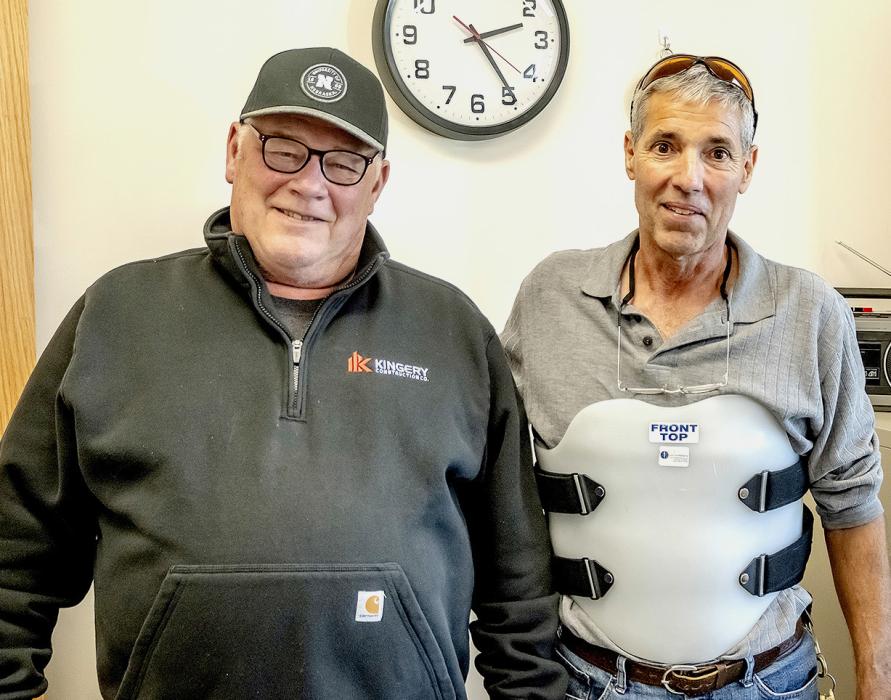 Kingery Construction Company of Lincoln, is celebrating their 100 year anniversary and were the builders of the Nebraska Department of Roads building. Pictured are Superintendent of Kingery, Steve Honnens and Superintendent of NDOR Dennis Connot. Photos by Laura Vroman