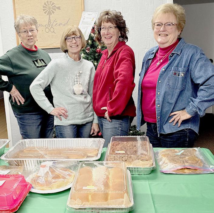 The Catholic ladies posed in front of what was left of their baked items, and are from L to R: Judy Johnston, Celeste Rogers, Rhonda Daily and Marian Nutter.