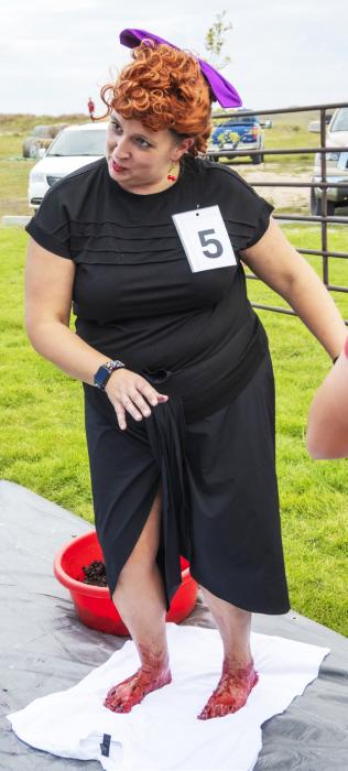 After stomping, the contestants put their footprints on a clean, white T-shirt. After the festivities, the group were entertained by the music of the Silverado Band.