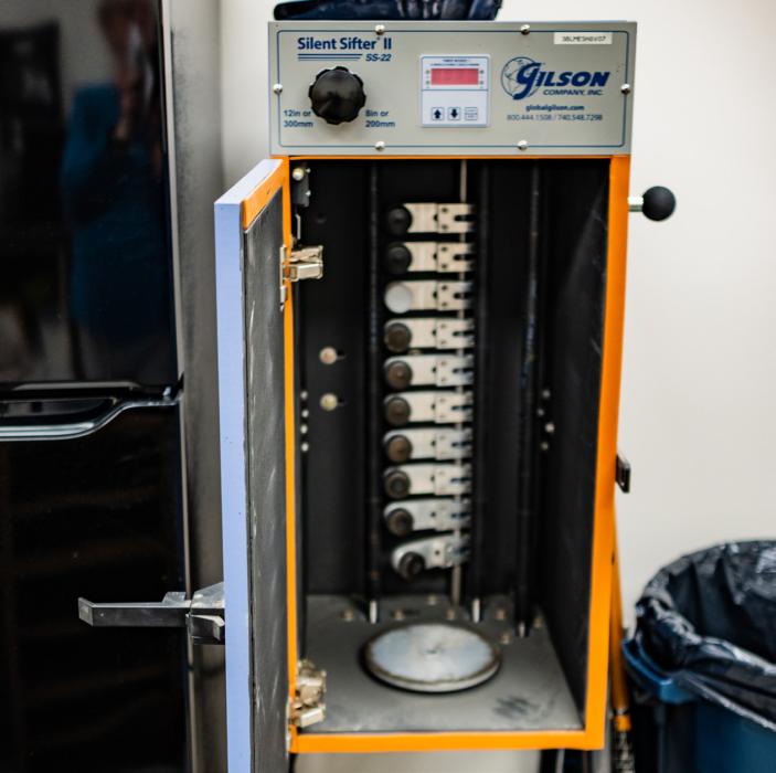 A nifty tool they have is a shaker sieve to sort different sizes of gravel in the construction lab.