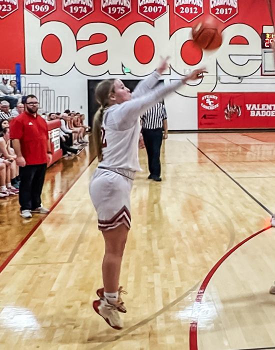 Sophomore Tierney Miller shoots a three-pointer in the final minutes of the Broken Bow game. Photo Danielle Arganbright