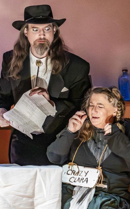 Clearly dismayed, Crazy Clara - Jean Vackiner is being bullied by Sly Scavenger - Jack Liddy, into signing the deed...did he succeed? Or did Clara out crazy good ‘ol Sly?