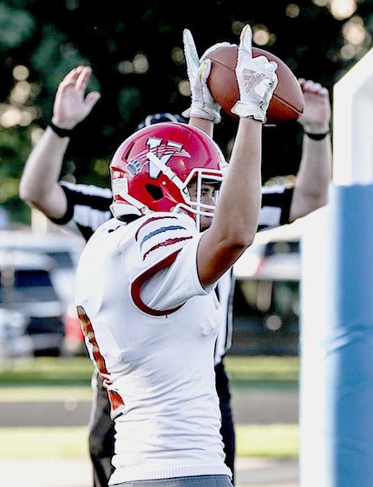 Andon Olson #2 with the first touchdown of the season. Photos by Nina Maria Nelson