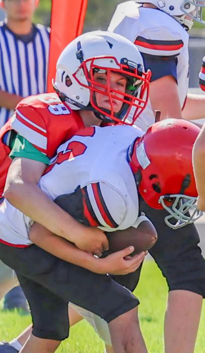 Ryker Liddy #38 with the tackle.