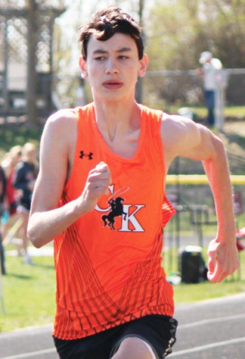 CKfreshmanTeagenFishdashing in the 100M during action at the Neligh-Oakdale Invite.