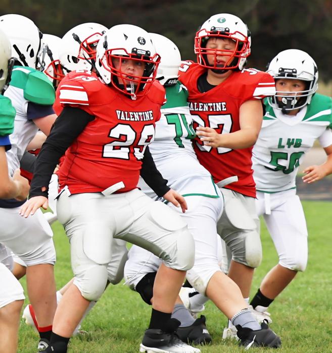 Tate Ward #29 and Dalton Graham #37 trying to hold the line.