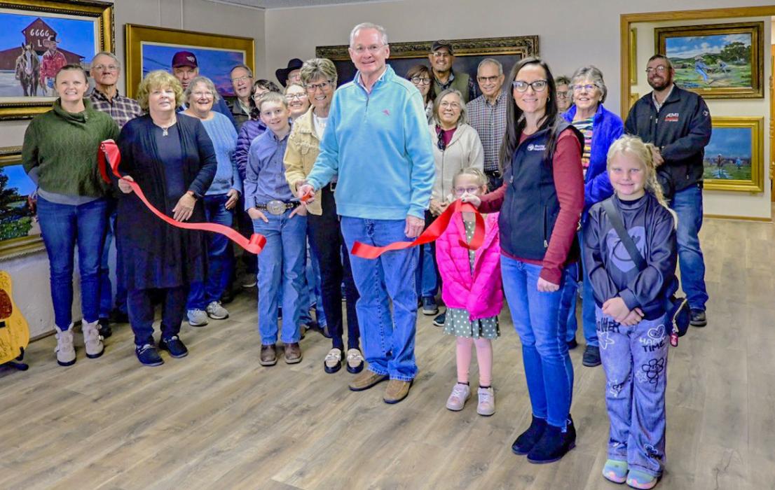 A large gathering showed up to wish Craig Beman their best on his Ribbon Cutting. Photo by Laura Vroman