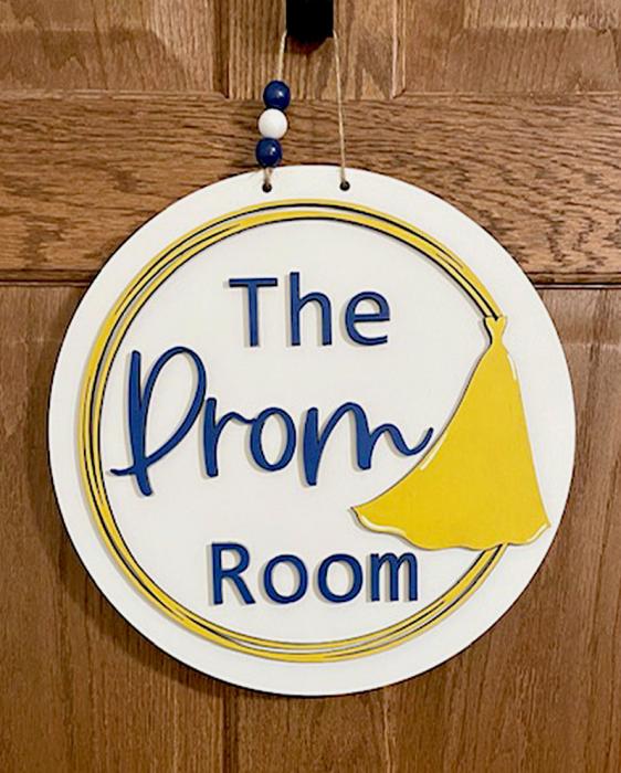 Meadow designed the signs for the doors of the Caring Closet and Prom Room, and they were made by Ronelle Kilmer using Todd County High School’s colors.