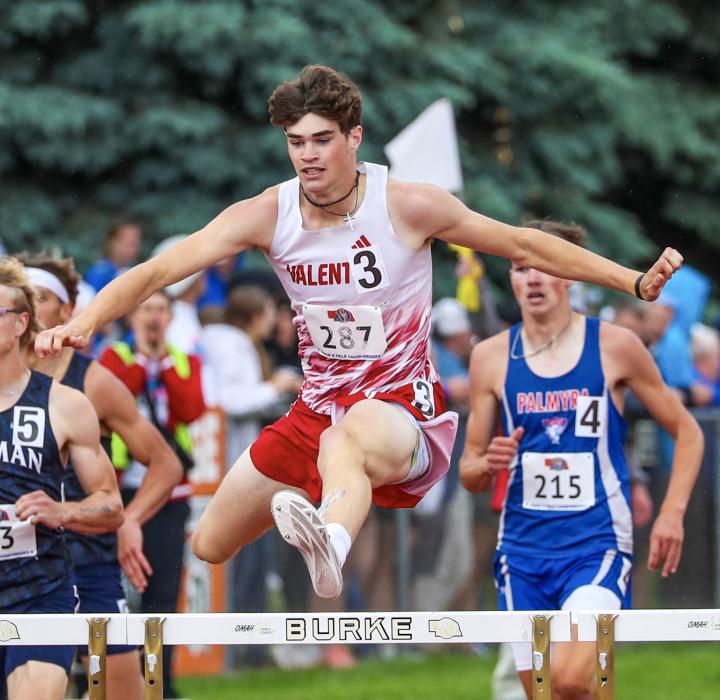 Isaac Cronin medaled in second place in the 300 Meter Hurdles, after leading the race! By 100th of a second!!