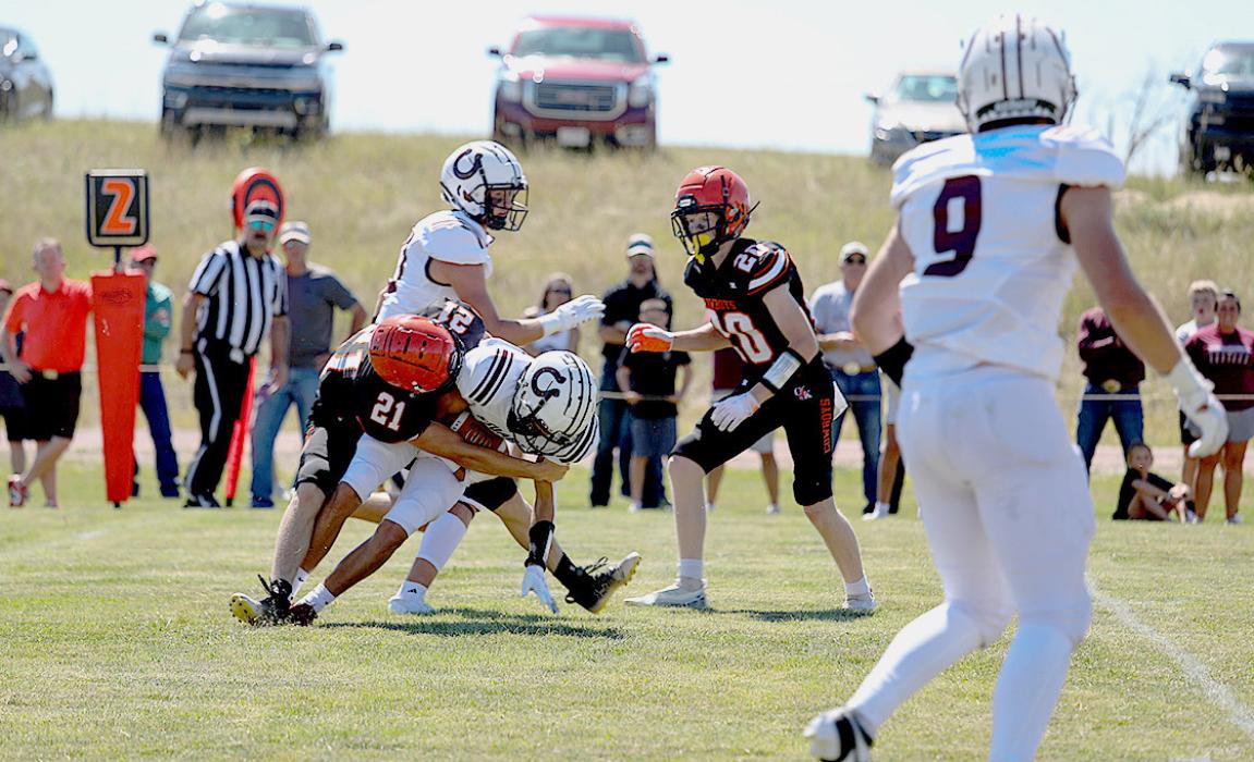 Jasper Roseberry #21 brings a Bronco to the ground during Friday’s season opener against Stuart.