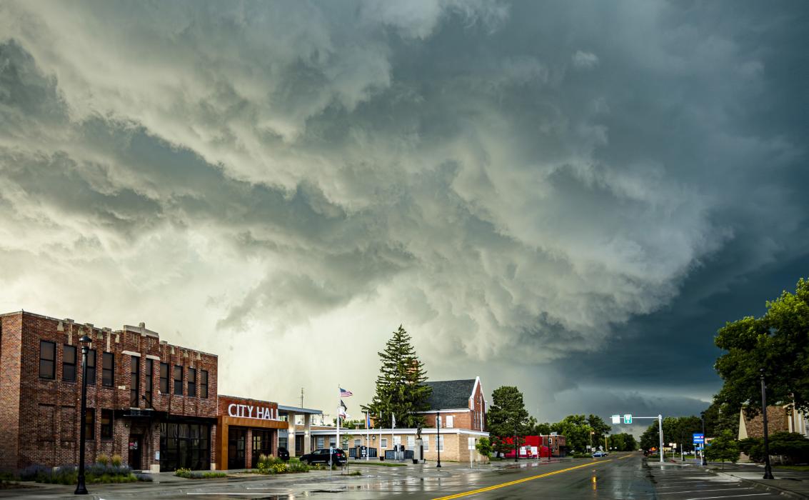 Looking north down Valentine’s Main Street with a sketchy looking cloud overhead that forecasters warned could have rotation, and tornado activity. Below, a light show continued after the rain fell, highlighting a large and interesting storm cell. Photos by Laura Vroman