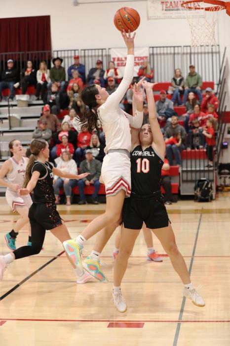 Aiden Hand #2 with a VHS layup as CK #10 tries to block. Photos by Nina Maria Nelson