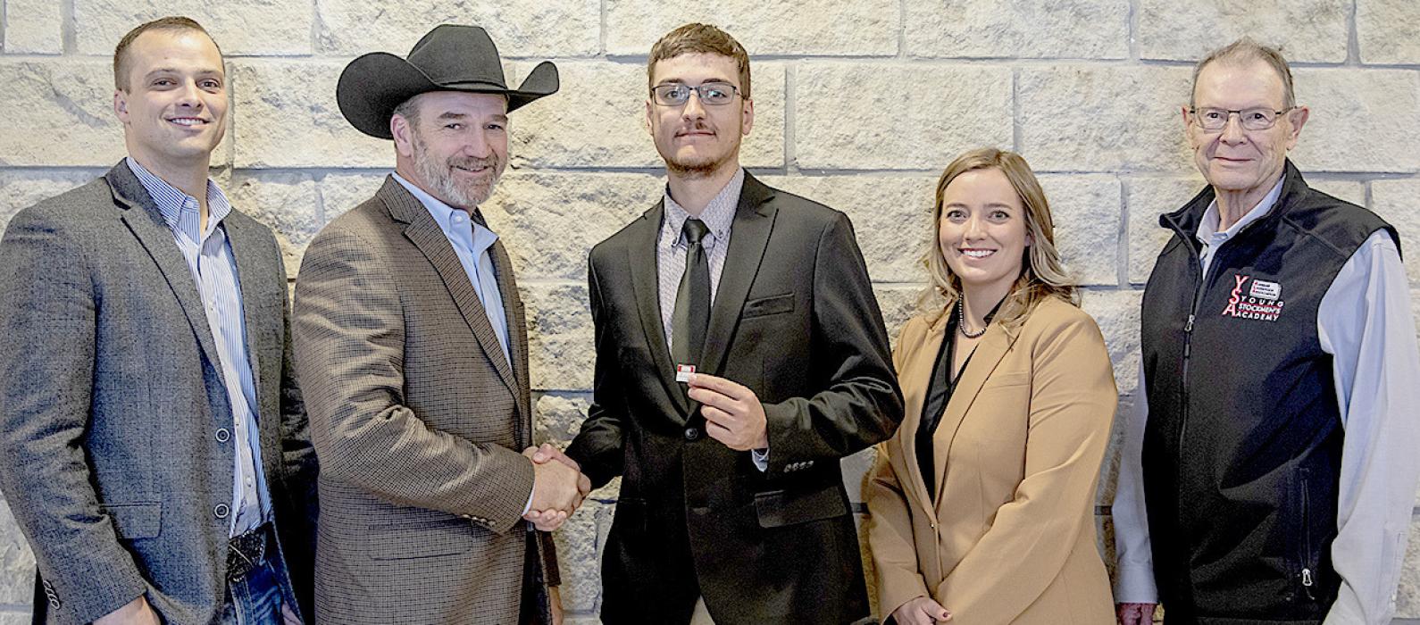 Pictured are from L to R: Cody Doubet, Merck Animal Health; Tim Parks, Merck; Brendan Whipple, Nenzel; Jenna Goetzmann, Merck; and Dave Worrell, Merck.
