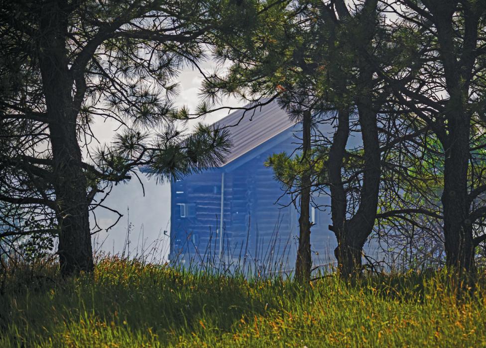 A cabin belonging to the Niobrara River Ranch is obscured by heavy smoke during the fire event, Sunday, May 31, 2026.