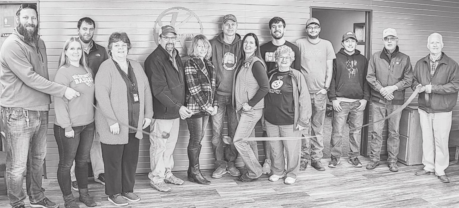 Pictured are from L to R: Chris Hernstrom, Deanne Holmes Monroe, Michael Kluender, Carolyn Peterson, Rowdy Kluender, Konni Kluender, Ken Fisbeck, Karlanne Fisbeck, Matt Klunder, Jean Kluender, Tim Peterson, Brandon Whiting, Larry Kluender, and Dean Jacobs. Photo by Laura Vroman