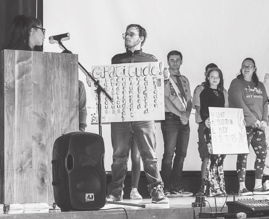 The Veterans Day Program at VHS concluded with the seniors sharing their acrostic poems about our military. Photo by Laura Vroman
