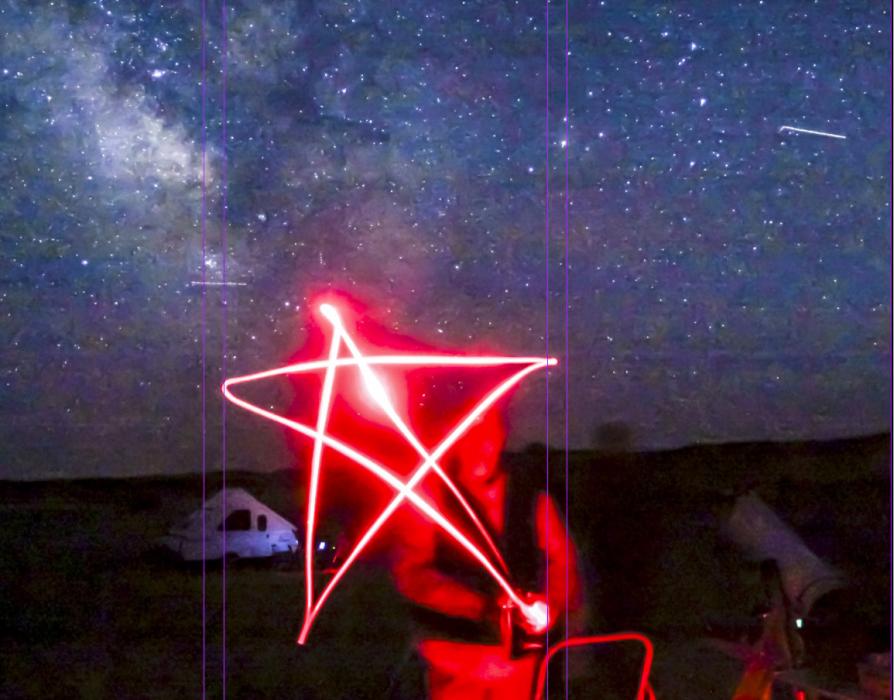 The Milky Way is rising in the background with twinkling stars overhead as the preferred red light makes a star statement in that Merritt Reservoir is the best place to view the night sky. Join them Friday for the public star party at the Snake Arm of Merritt Reservoir. Come early to learn the sky and get your eyes used to the darkness, then step into darkness!!! Photo by Laura Vroman