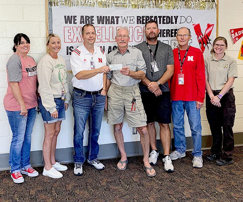 Pictured are from L to R: JJ Thorpe. Alison Larsen, Jeff Sayer, Sandhills Prairie Refuge Association Gordon Warrick, Nick Larsen, David Schultz, Katie Patterson.