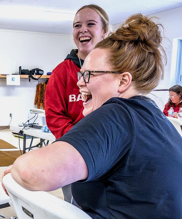 dinal and a VHS student have a laugh during the program. Here’s hoping you can find humor in some of your life changes! Business teacher Alana Car-