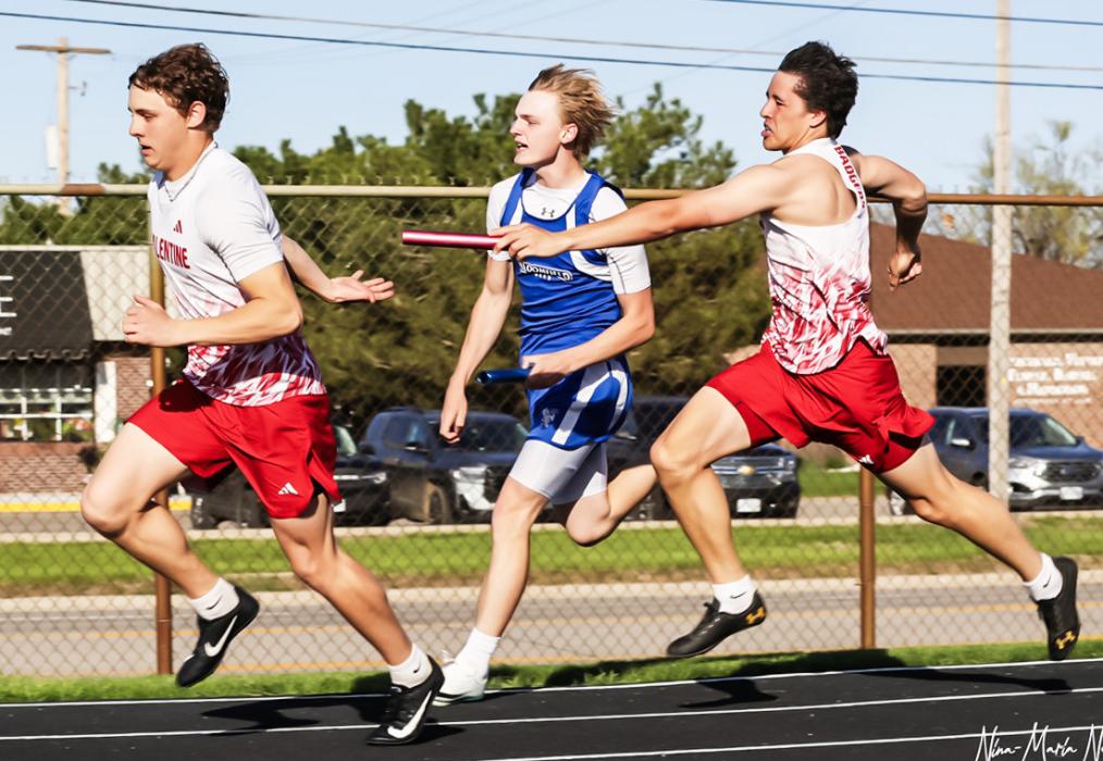 It’s a handoff from Andon Olsen to Trystan Beebout in the 4x100. Other members of the 4x100 team included Dominic Beebout, and Jekhi Williams. Photos by Nina-Maria Nelson