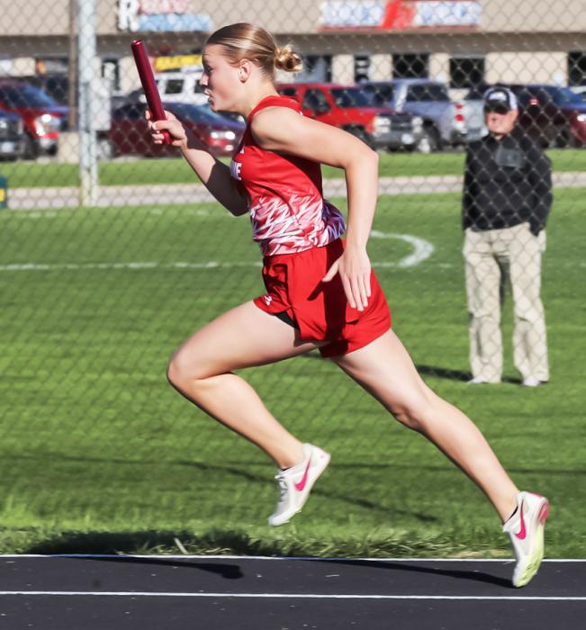 Joni Cox begins the first leg of the 4x100 Meter Relay. Other team members included Maeli Patterson, Danika Janssen and Paige Sprenger.