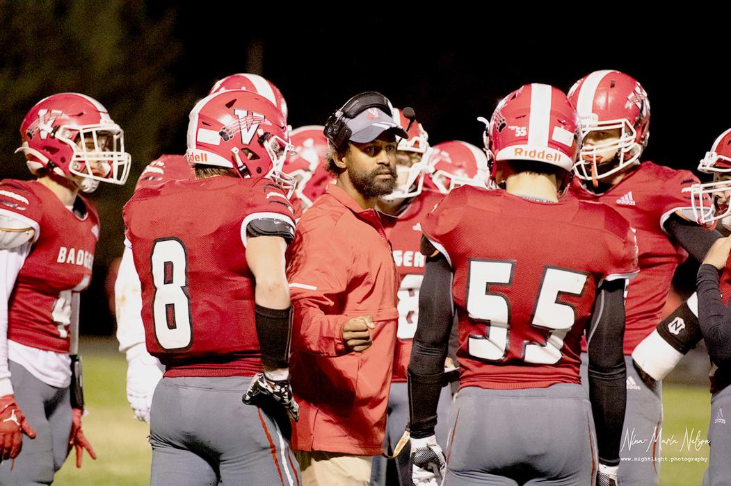 Group huddle with Coach Little