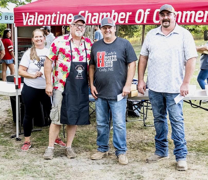Pictured in the sides category are from L to R: Host Deanne Holmes Monroe; first place, Rick Holmes with cherry cobbler; second place, Husker Hub with apple cobbler; and third place, Elliott Swezey with cheesy potatoes.