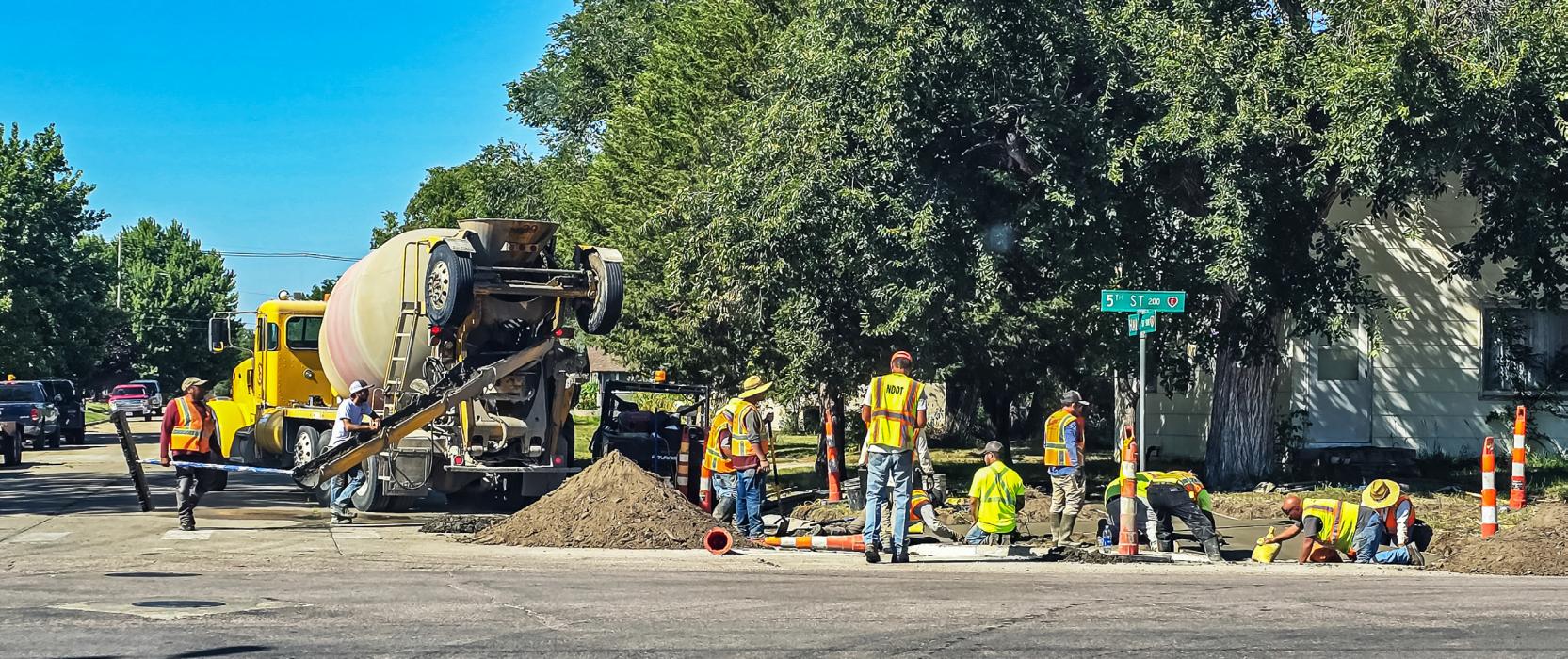 With an extremely hot summer, Kirk Barnes Construction continued to lay the new ADA crosswalks along Highway 12. Photo by Laura Vroman