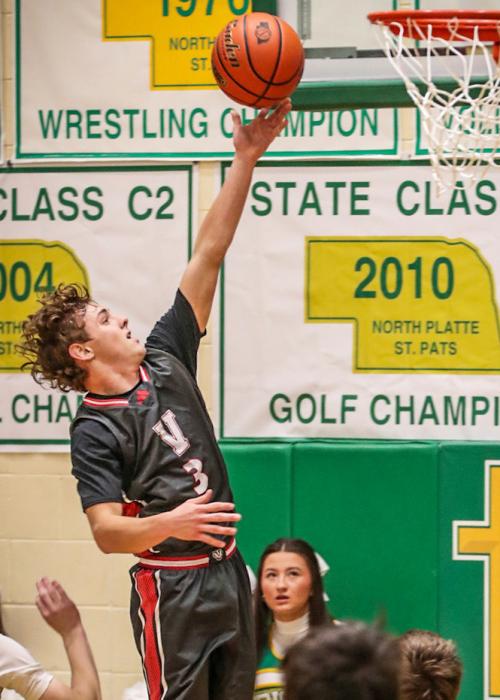 Tryston Beebout lay up on the left. Photo by Nina Maria Nelson