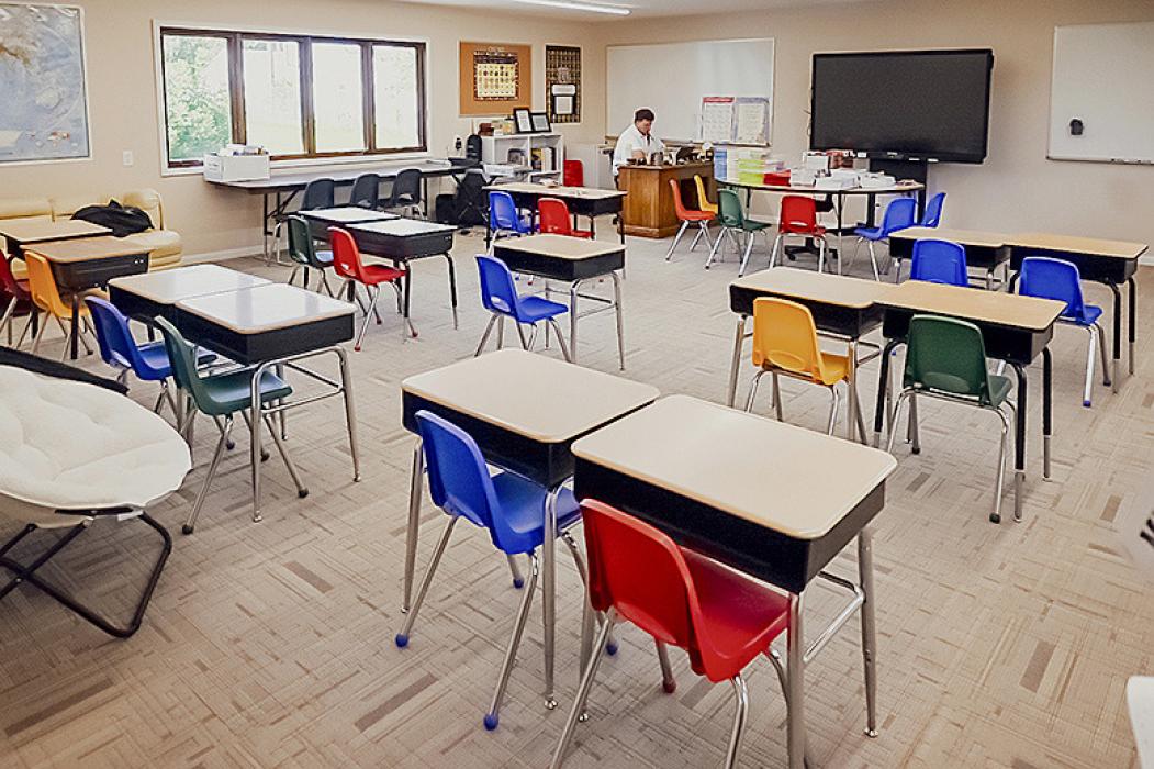Mr. Krause prepares for students in the new middle grade classroom at Grace Lutheran School. The room is approximately 900 square feet, and is the second addition the school has added in the past two years as their student numbers have continued to increase. Photo by Laura Vroman
