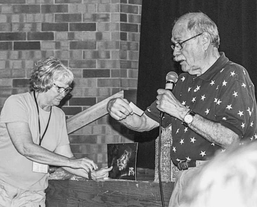 Two of the organizers for the Nebraska Star Party, Nina Baker and John Johnson, give out door prizes at the Wednesday afternoon program. Photos by Laura Vroman