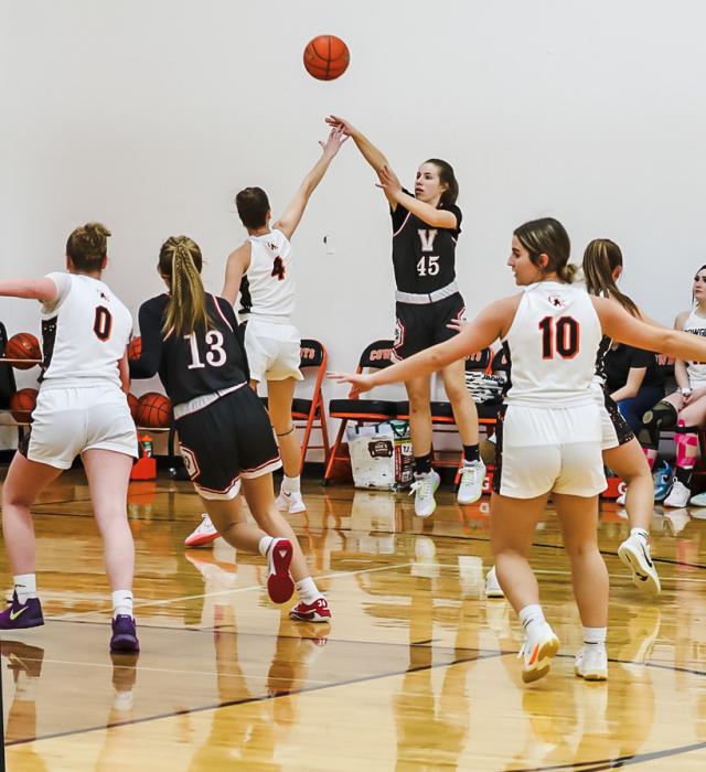 Annalena Nelson makes three points in the game against Cody-Kilgore.