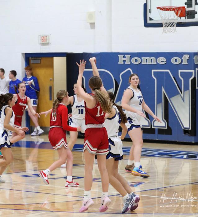 Paige Sprenger makes a three point shot in the game against Hershey.