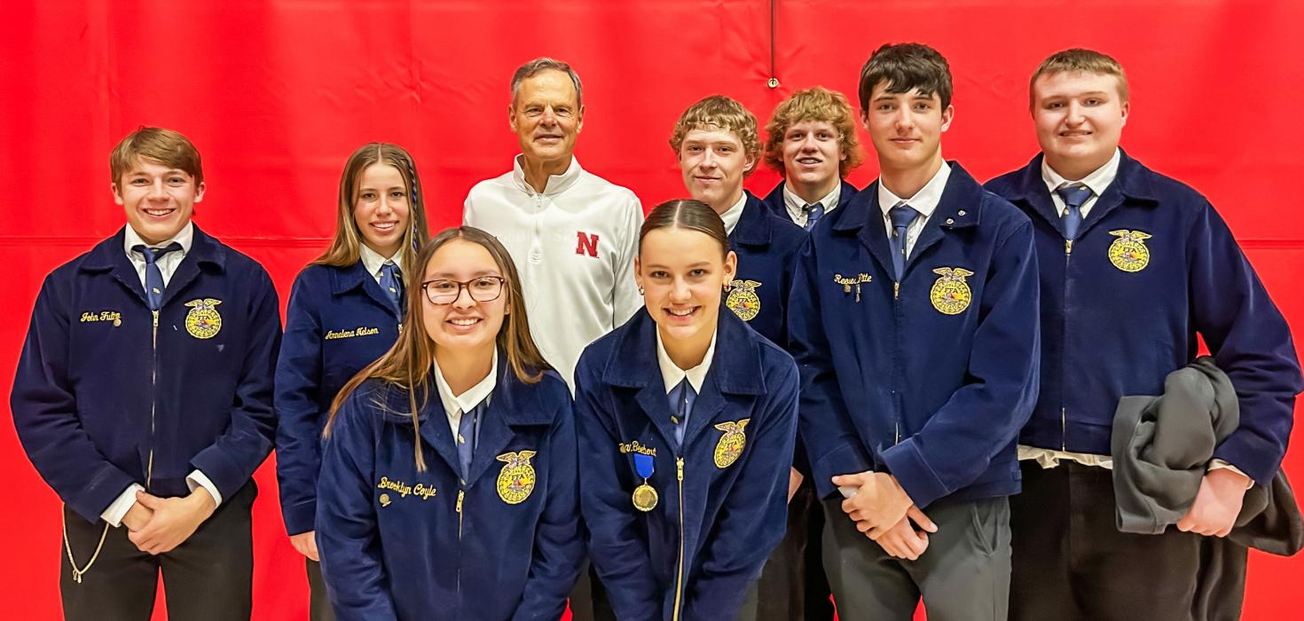 A highlight for several of the Badgers was meeting Coach Cook, who addressed the FFA members at the UNL Coliseum. Photo by Nina Maria Nelson