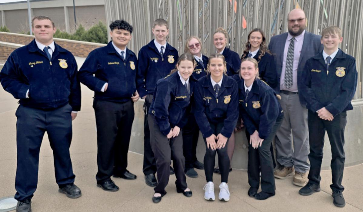 The 2025 CK FFA chapter strikes a pose at the state convention in Lincoln, NE. Pictured are back row, L to R: Wesley Willert, Emiliano Garza, James Walkling, Kynzee McConaughey, Kayleigh Ravenscroft, Allison Heath, CK FFA Sponsor, Mr. Justin Nollette, and Luke Cooper. Front row, L to R: Amanda Pongratz, Rachel Farley, and Lilly Ravenscroft.