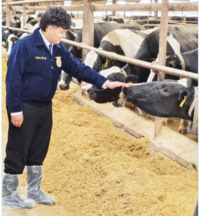 Emiliano Garza makes a friend at State FFA.