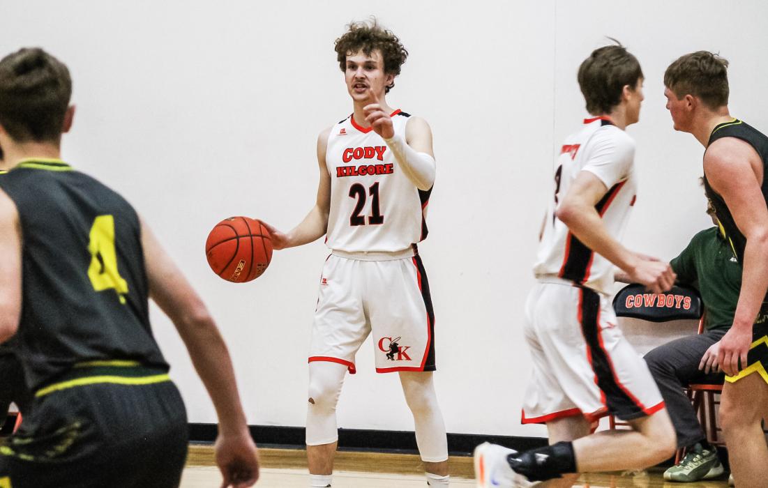 CK senior Jasper Roseberry setting up the offense during subdistrict basketball action versus Hay Springs. The Cowboys defeated the Hawks 65-63. Photos by Zoey Dorian