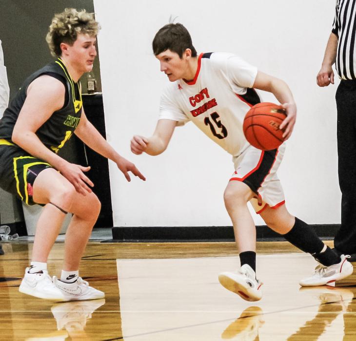 CK junior Hesston Fay brings the ball down the court.