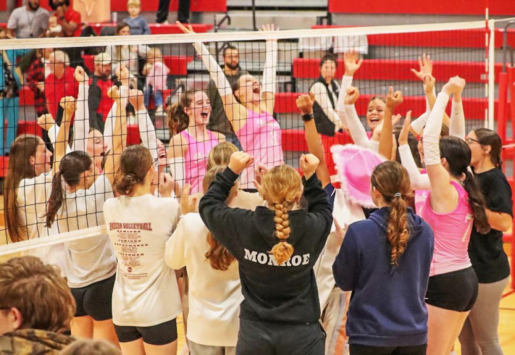 The entire Lady Badger team celebrates victories after their triangular. Photos by Nina Maria Nelson