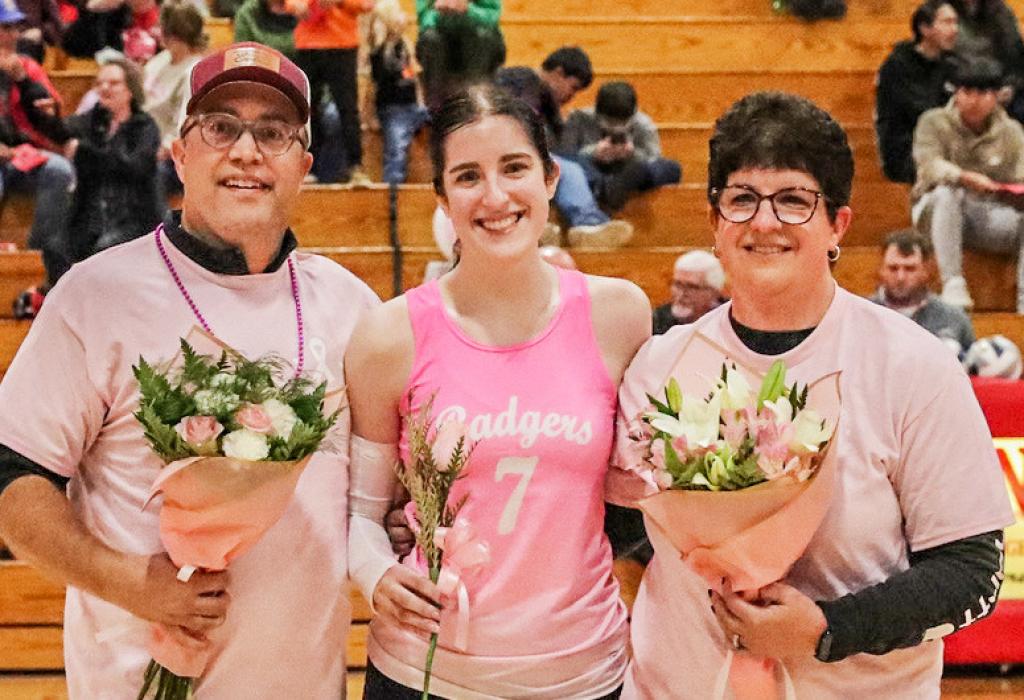 Senior Ashlyn Hutchinson with her parents on Parents Night.