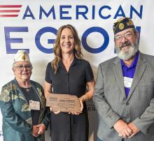 Pictured are from L to R: Nebraska State Commander Judy Walters, Teacher of the Year Angela Anderson, and Legion Post 319 Commander Jerry Fullerton.