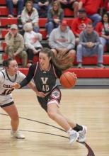 Annalena Nelson #45 working her way past defense.