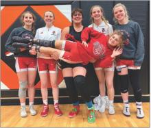 The Lady Badger Wrestling team at VHS has the following NSAA State qualifiers. They’re pictured from L to R: Danika Janssen, Bailey Burdick, Addie Sexson, Samantha Sprenger, Haddison Mundorf holding Reegan Eggert. Photo by Lorana Eggert